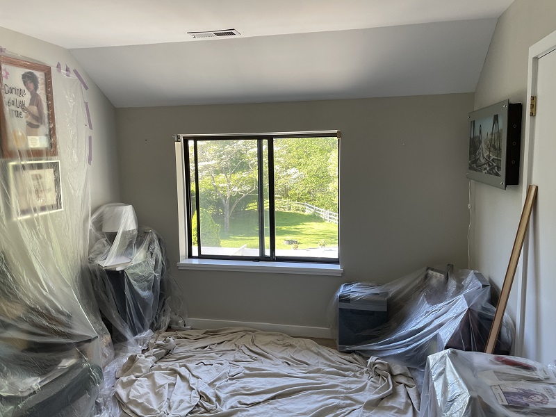 THe roomed is prepped, everything covered in plastic and tarps protecting the floors